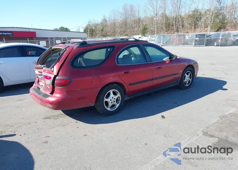 2000 Ford Taurus Se z USA, uszkodzony, nr VIN 1FAFP58S4YA197839